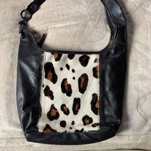 innue black and animal print bag